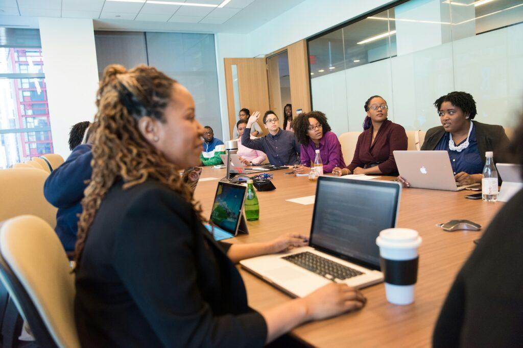 state-employee-injury-claims a group of employees sitting in a meeting room